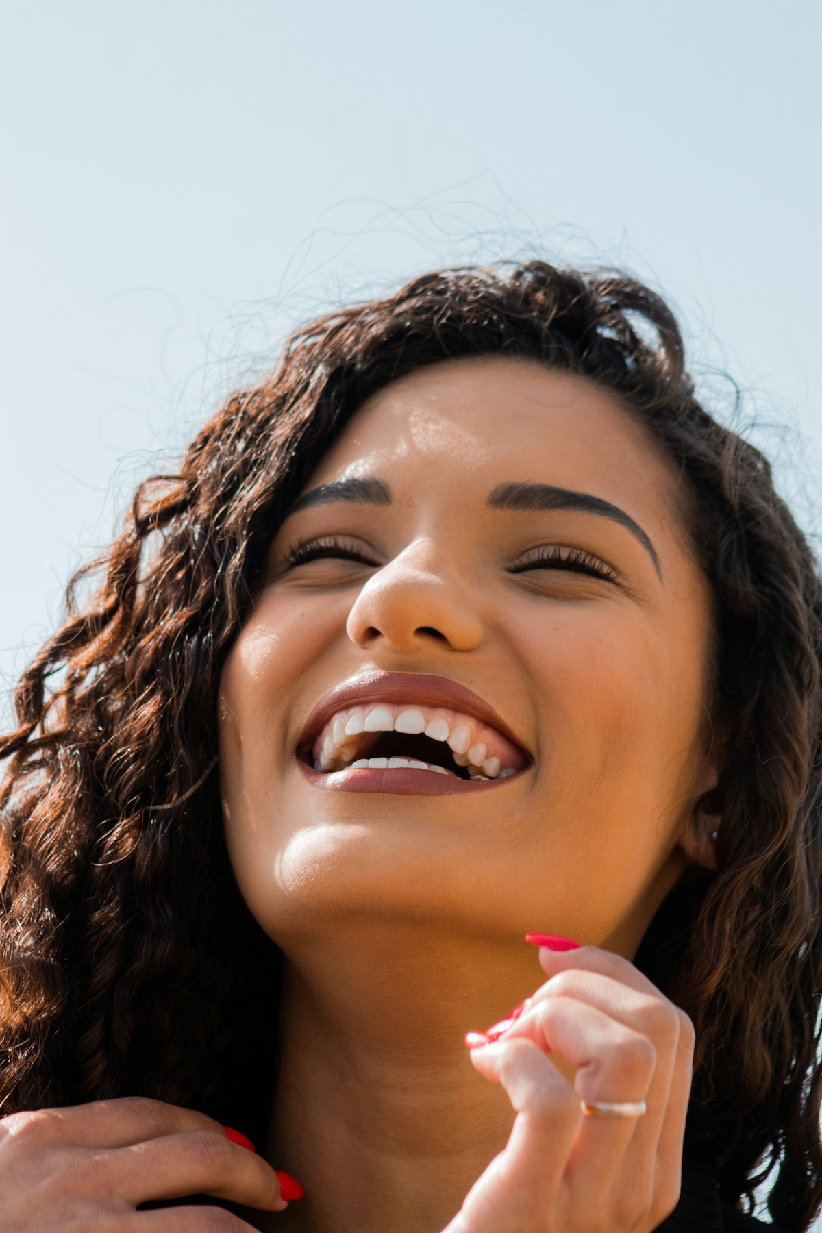 Patient smiling confidently after dental treatment